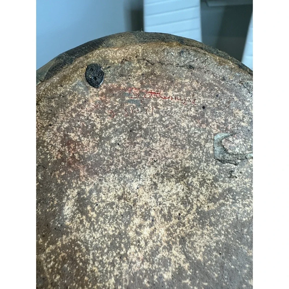 antique stone vase‎ with ornament in the form of fish